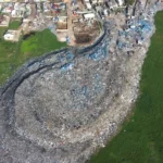 New investigation reveals tons of discarded British clothing dumped in Ghana’s protected wetlands