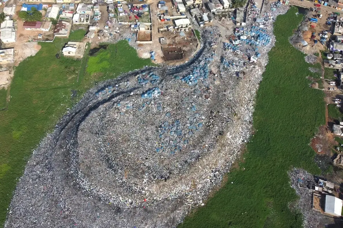 New investigation reveals tons of discarded British clothing dumped in Ghana’s protected wetlands