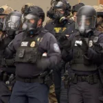 ICE Counter-Protester Charged After Punching Woman Trying to Leave Portland Demonstration