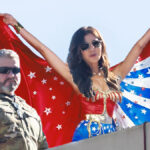 Kristi Noem Strikes Superhero Pose on Portland ICE Building in Over-the-Top Photo Op
