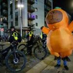 Peaceful Protest Near Willamette River Features Inflatable Costumes to Raise Awareness Outside ICE Center