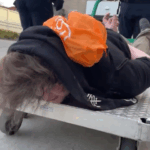 WATCH: ICE Officers Haul Cuffed Portland Suspect on Flatbed Cart Amid Protests