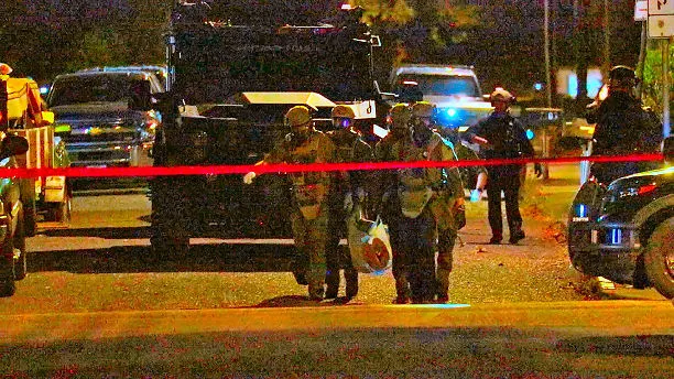 Officers Become Rescuers When Suspect Shoots Self